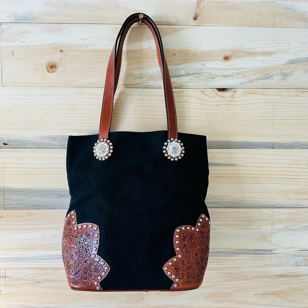 Black and brown western tote with leather acents
